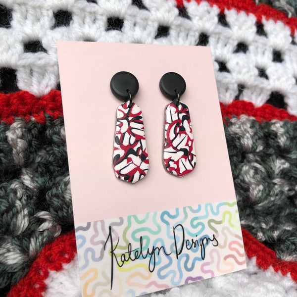 Iconic Geometric Dangle Studs